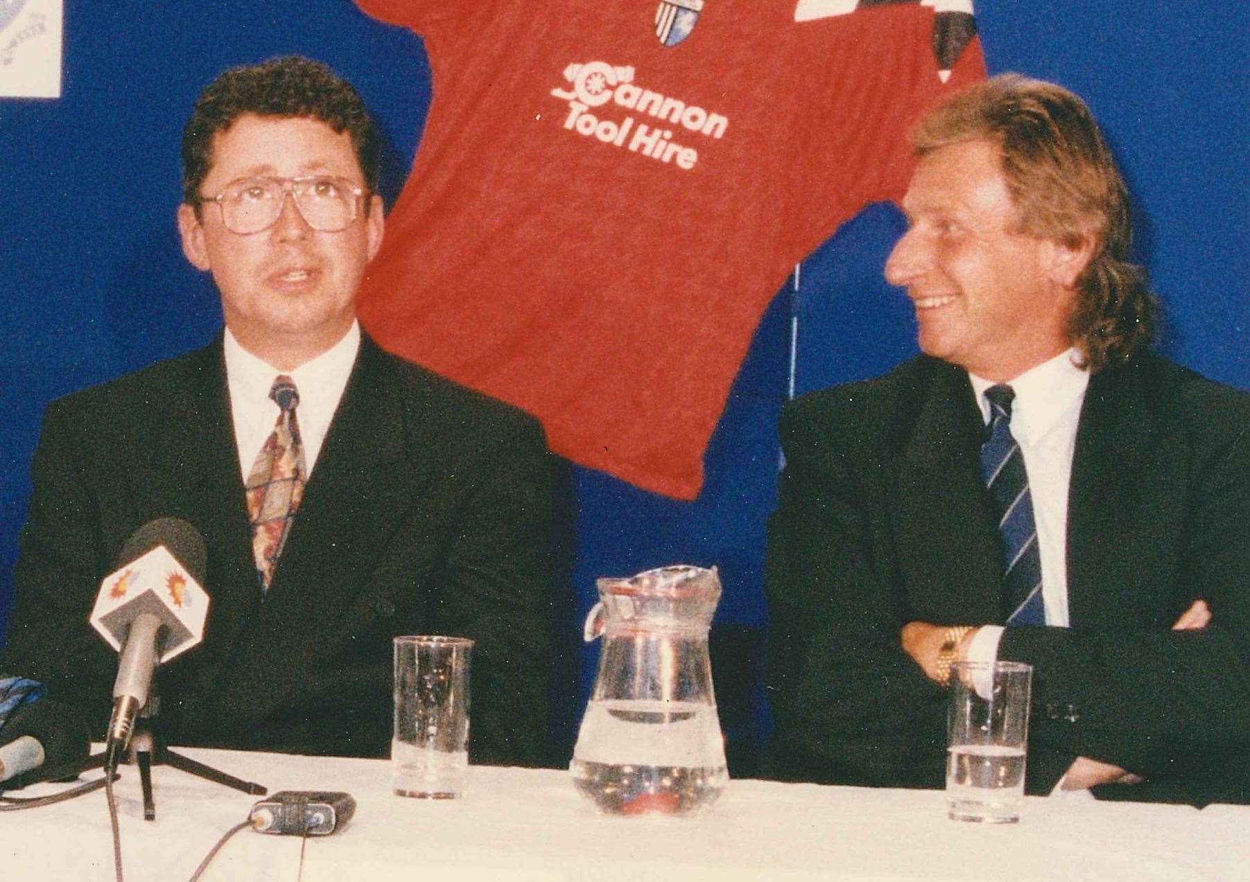 Paul Scally is announced as Gillingham's new owner in June 1995 after purchasing the club from Tony Smith, right.