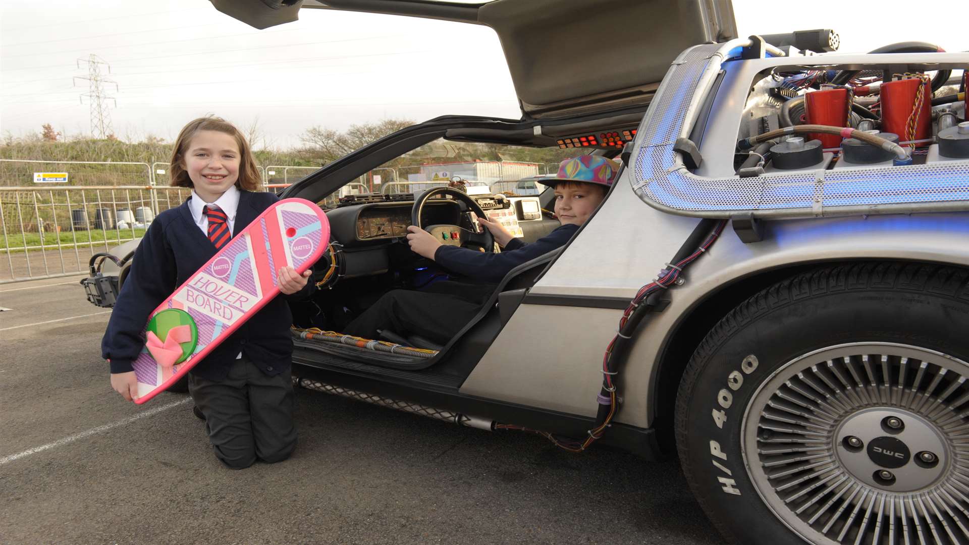 Lily and Ryan, both 10, with the famous vehicle at Queenborough school