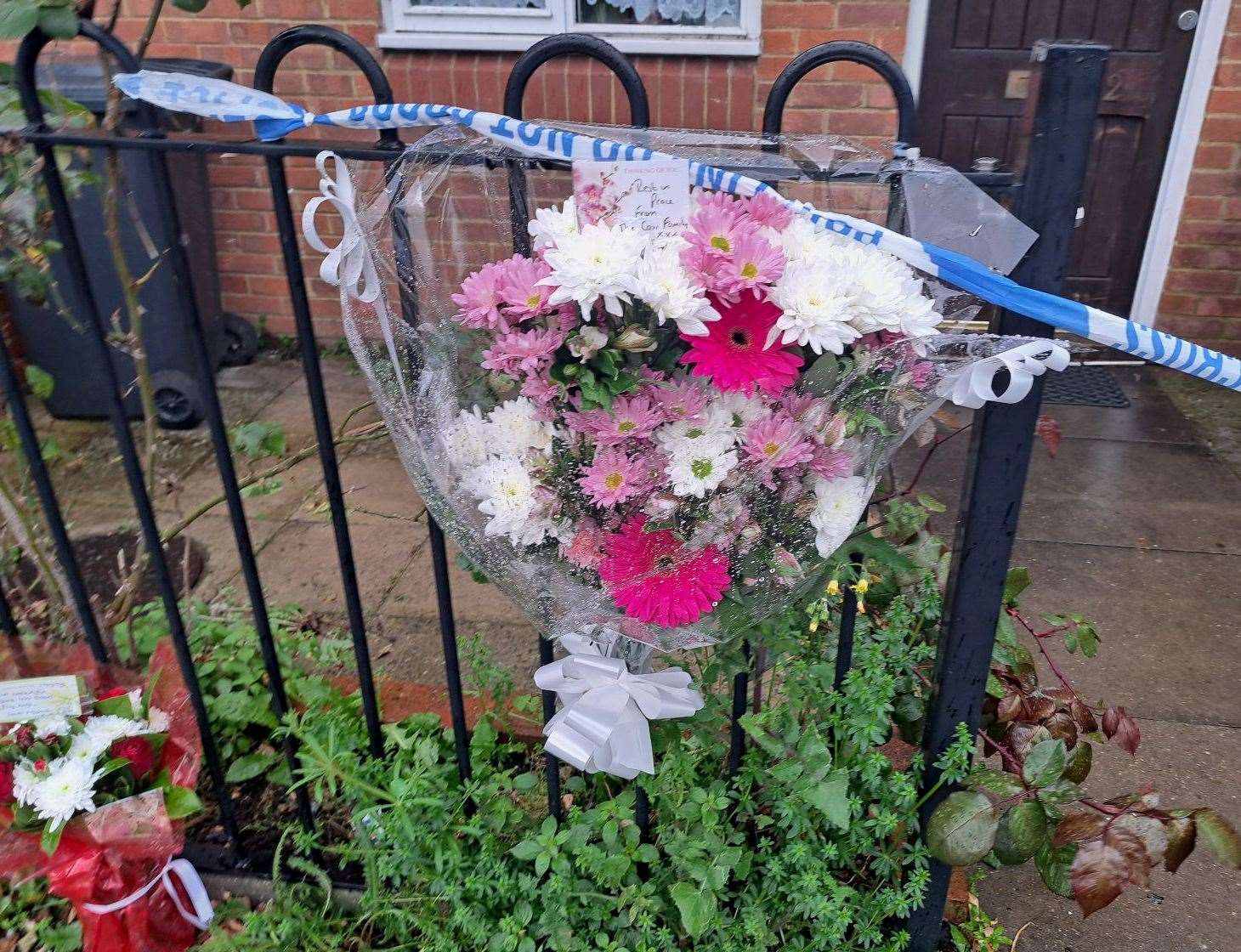 Flowers outside the house where the shooting was in Dartford