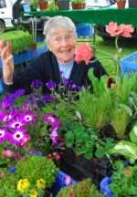 Iris Levy with her coastal garden plants which will be on sale at the farmers market