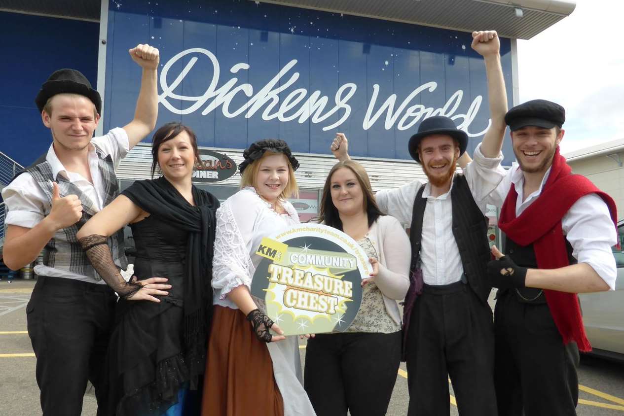 Dickens World Booking Co-ordinator Clare Pointer (casual clothes) joins Dickensian characters Lilian Fern, Clara Barley, George Snow, Archie Bunce and William Dorrit to promote the attraction's support of the KM Treasure Chest initiative