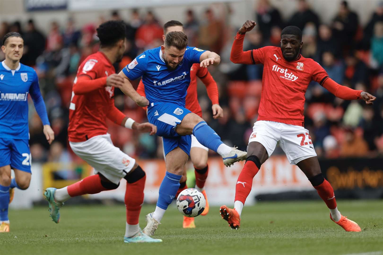 Alex MacDonald with a chance for the Gills at Swindon in the opening half