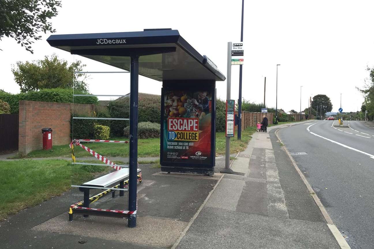 Tape has been put on a damaged bus shelter near Castle Road in Allington, Maidstone.