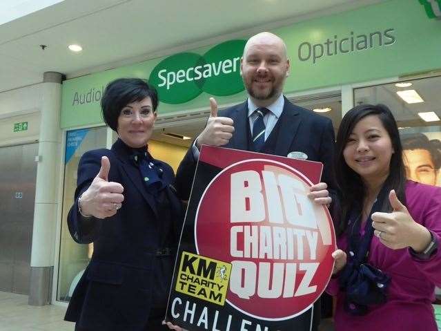 Benita Lowe, Dan Shaw and Angela Lan Hing Lit of Specsavers give the thumbs-up to the KM Big Charity Quiz (9794552)