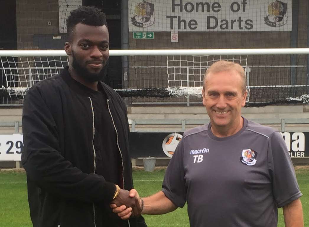 Duane Ofori-Acheampong shakes hands with Dartford manager Tony Burman