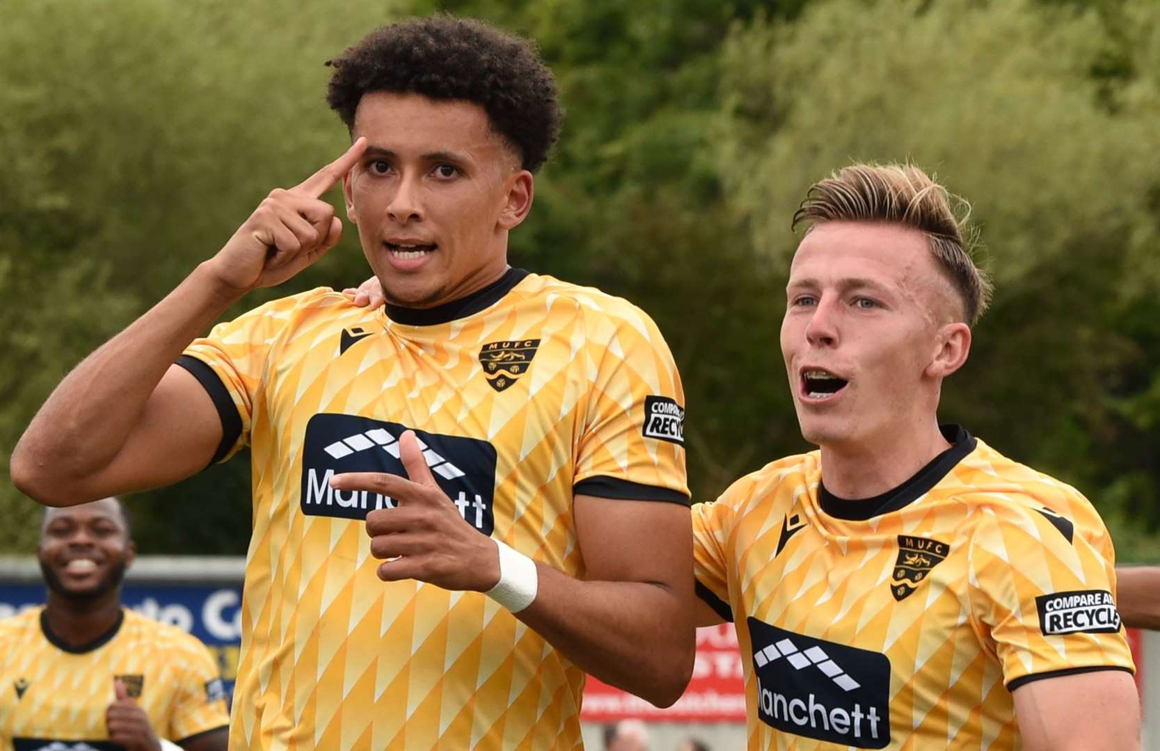 Sol Wanjau-Smith celebrates scoring for Maidstone on Saturday with Sam Corne. Picture: Steve Terrell