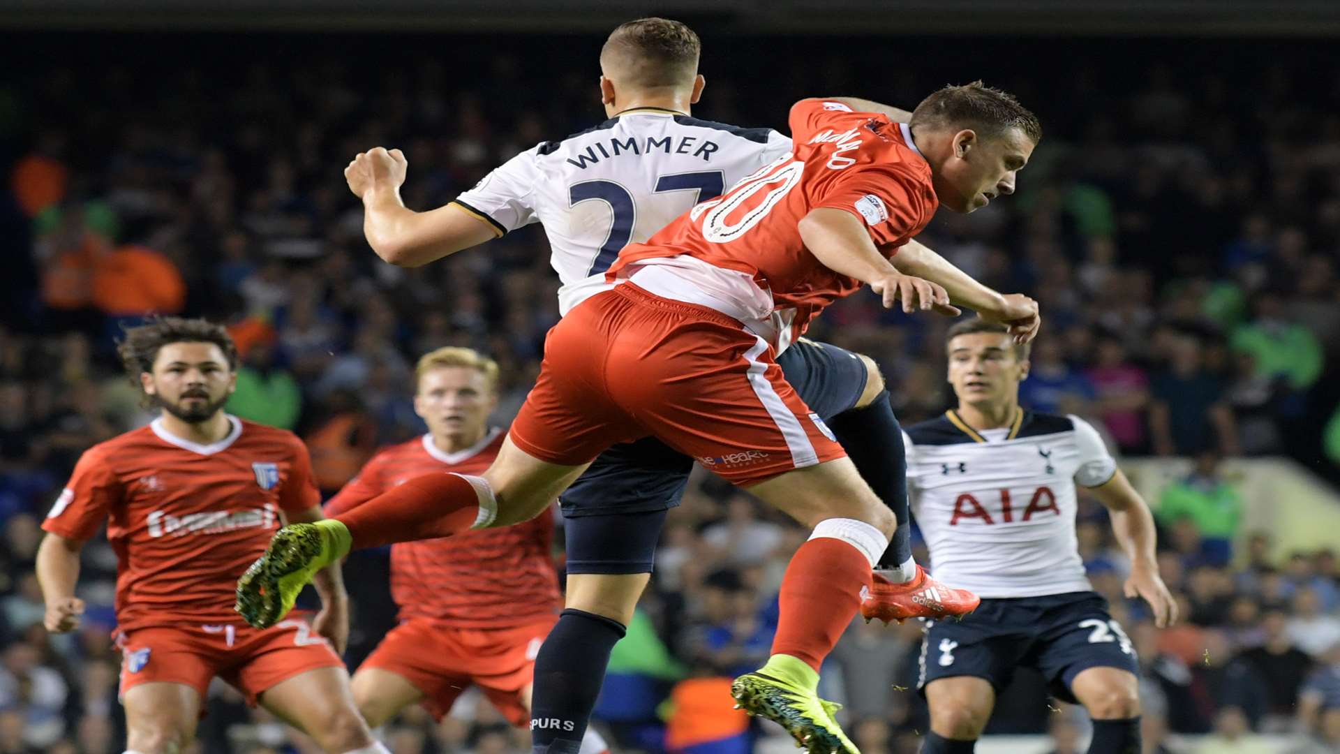 Cody McDonald battles with Spurs' Kevin Wimmer Picture: Barry Goodwin