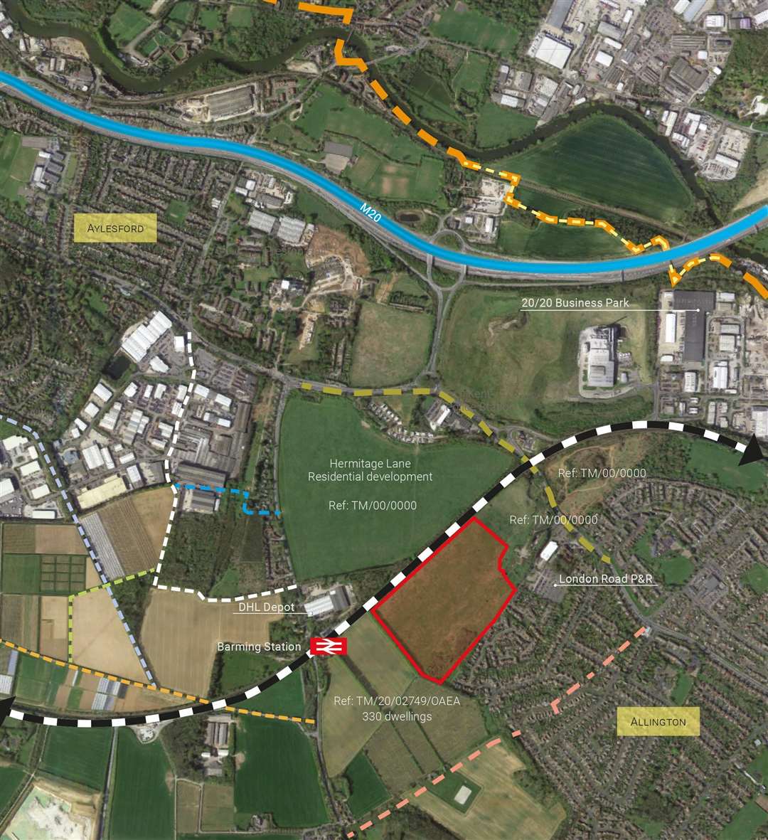 The red outline shows the proposed development site adjacent to the rail-line