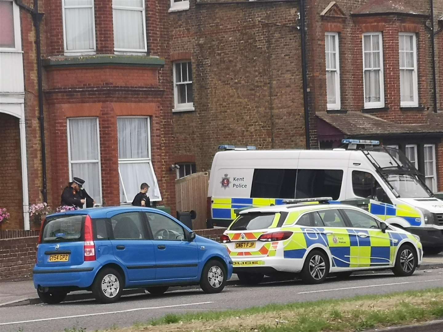 Police have surrounded the property in Canterbury Road