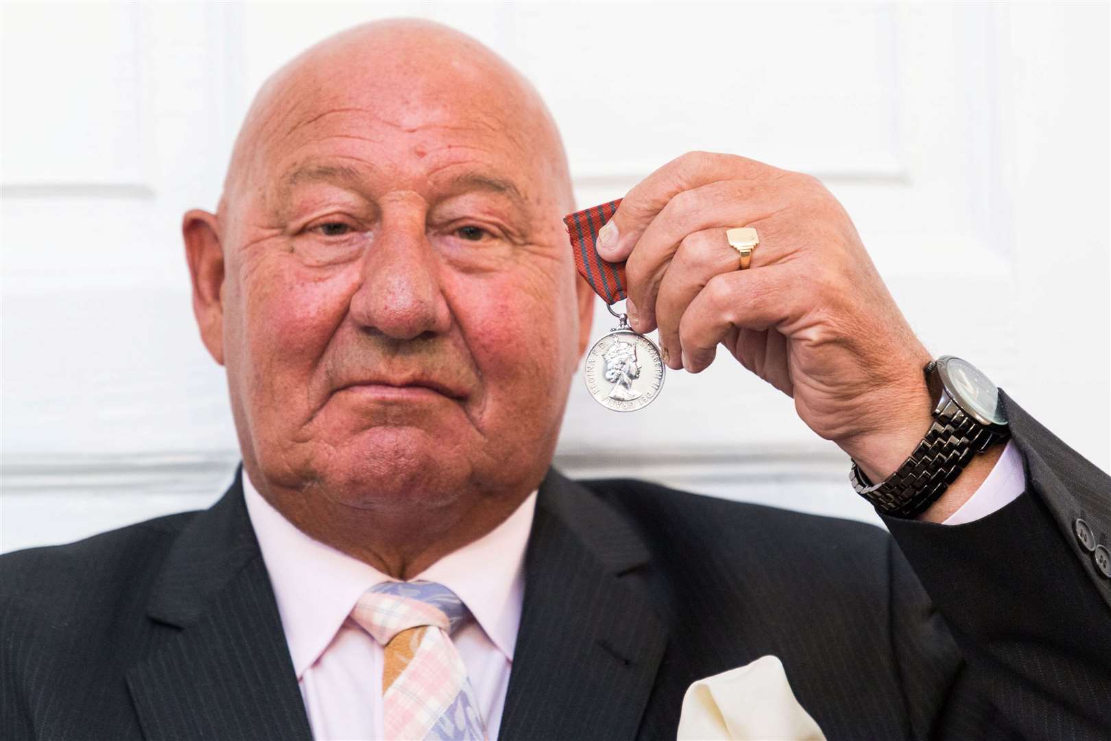 Ronnie Russell with his George Medal at Dix Noonan Webb, London. Picture: SWNS