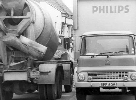 Drivers of large vehicles have had difficulty passing each other in the high street for decades