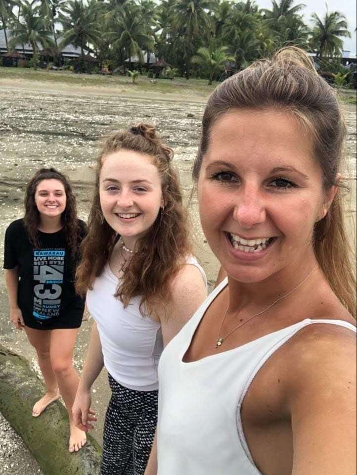 Emma, left, with friends she met whilst backpacking. Picture: Kim Hough