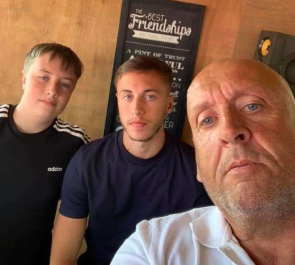 Taxi diver Graeme with two of his sons, Joe (left) and Charlie (right)