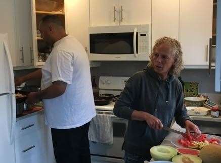 Lana Vanzetta cooking with her son Grant in Canada. Picture provided by Maxine Vanzetta