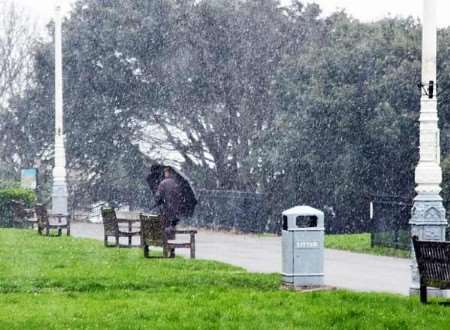 Time for a brolley and to head indoors. The scene on Folkestone Leas this morning. Picture: CHRIS DENHAM