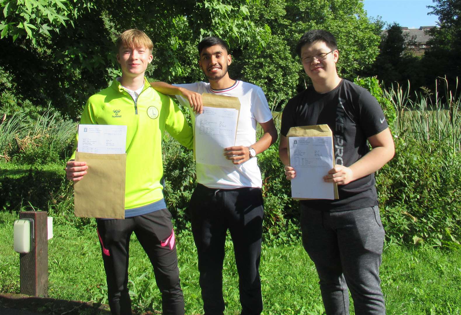 Pupils at Barton Court Grammar School in Canterbury collect their A-level results