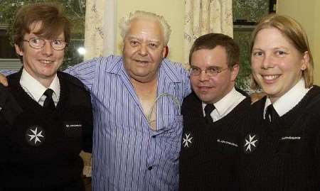 Ray Marriott with the St John Ambulance crew who saved him. Picture: GAVIN CRAYFORD
