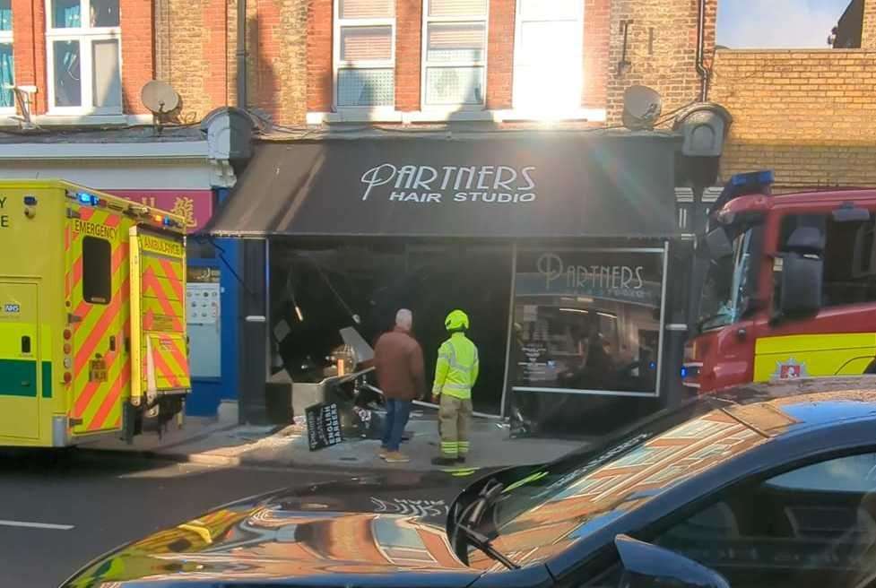 A car crashed into Partners Hair Studio in Herne Bay High Street. Picture: Lucy-Lou Dunthorne