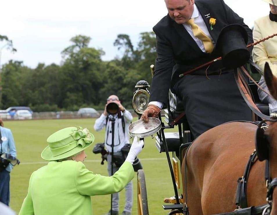 Michael Malone being presented with the Golden Guinea Challenge trophy by Her Majesty the Queen. Picture: Paul Orchard