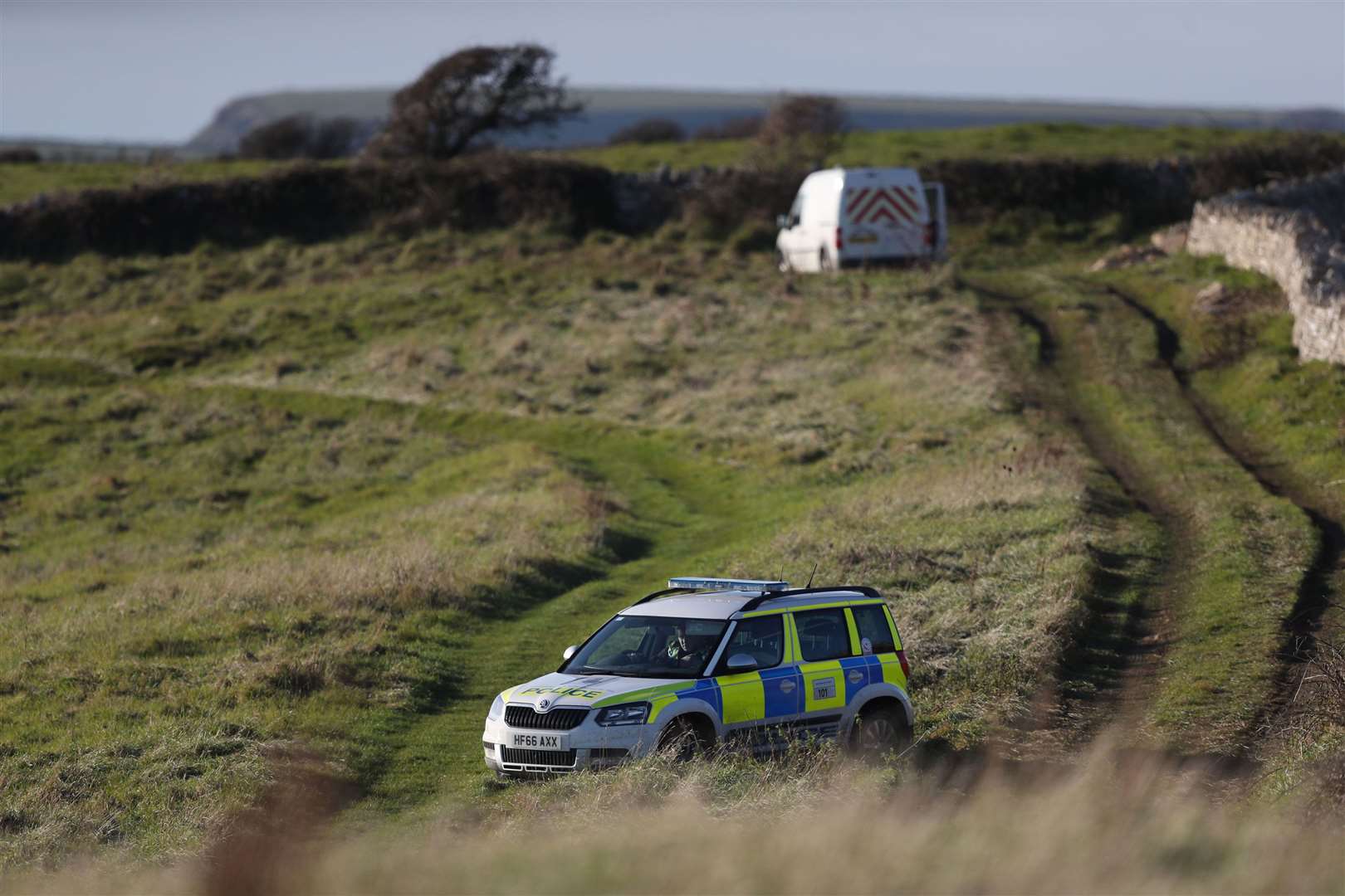 Police activity on a costal path near Swanage, Dorset as a body has been discovered in the hunt for the missing 19-year-old Gaia Pope (PA)