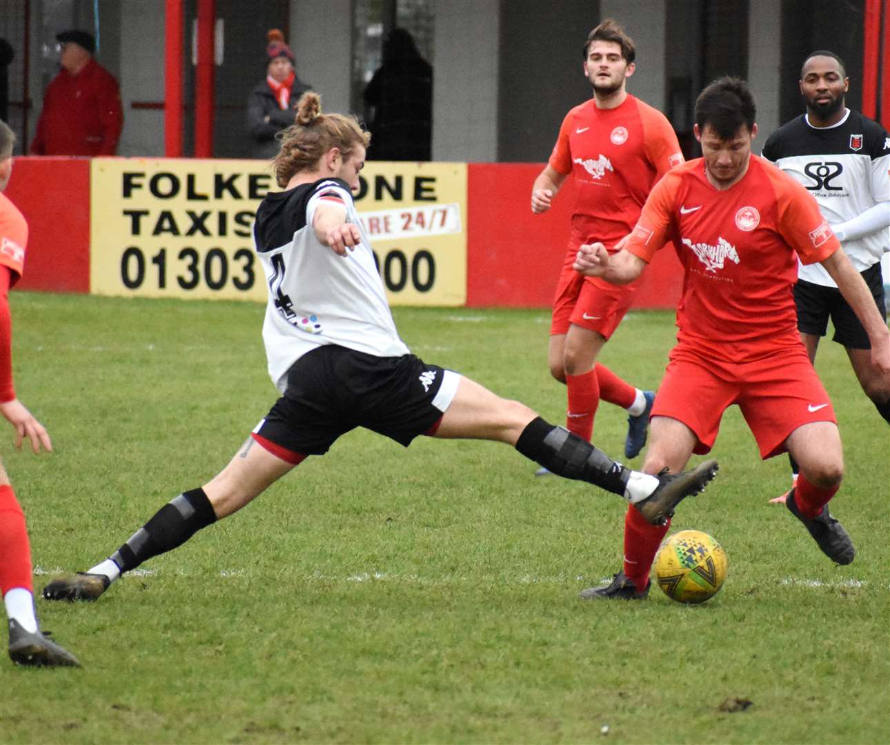 Midfielder Lewis Chambers puts a foot in for Town. Picture: Randolph File