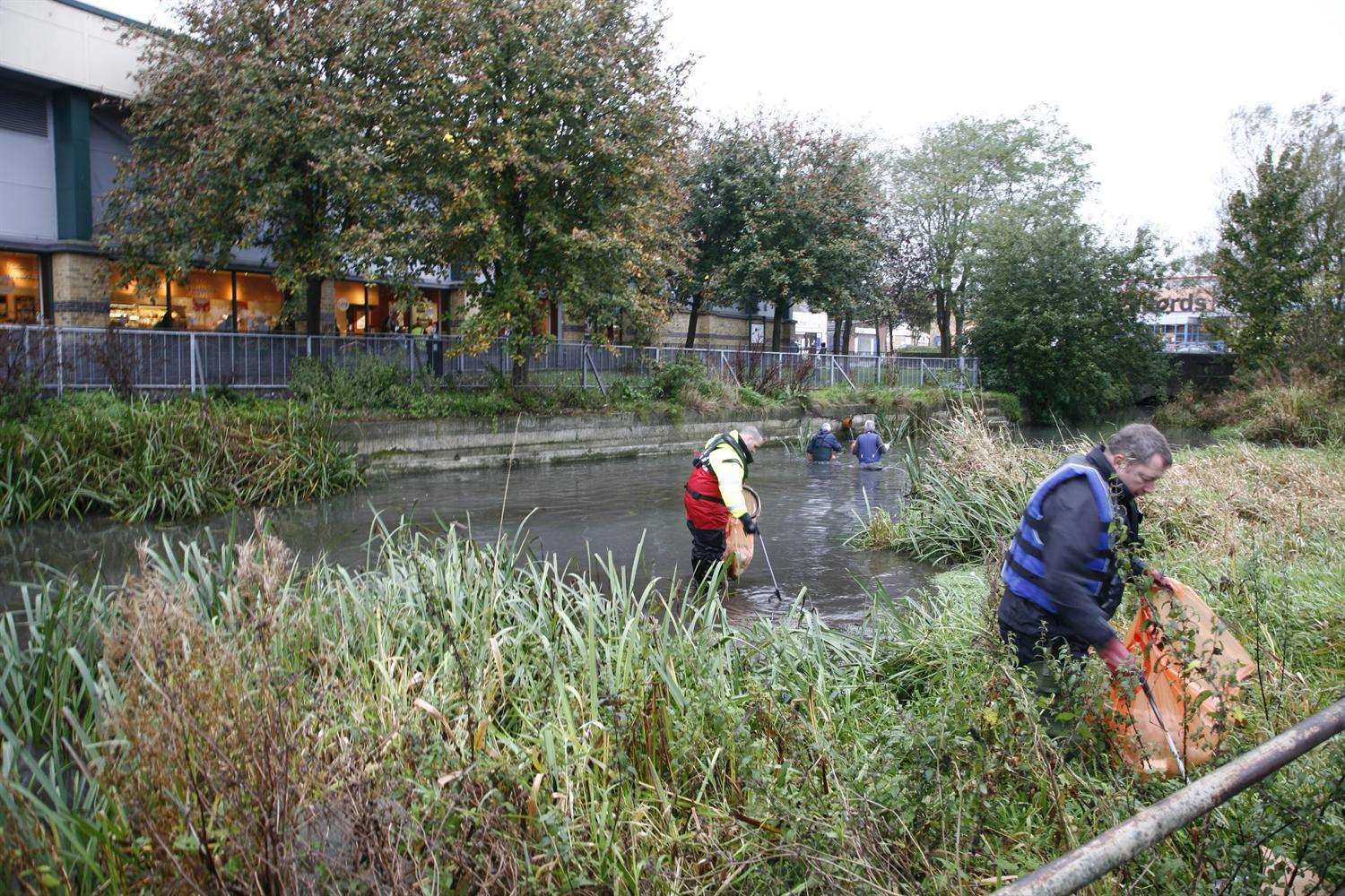 Volunteers taking part in one of the clean-up sessions in the River Dour last year.