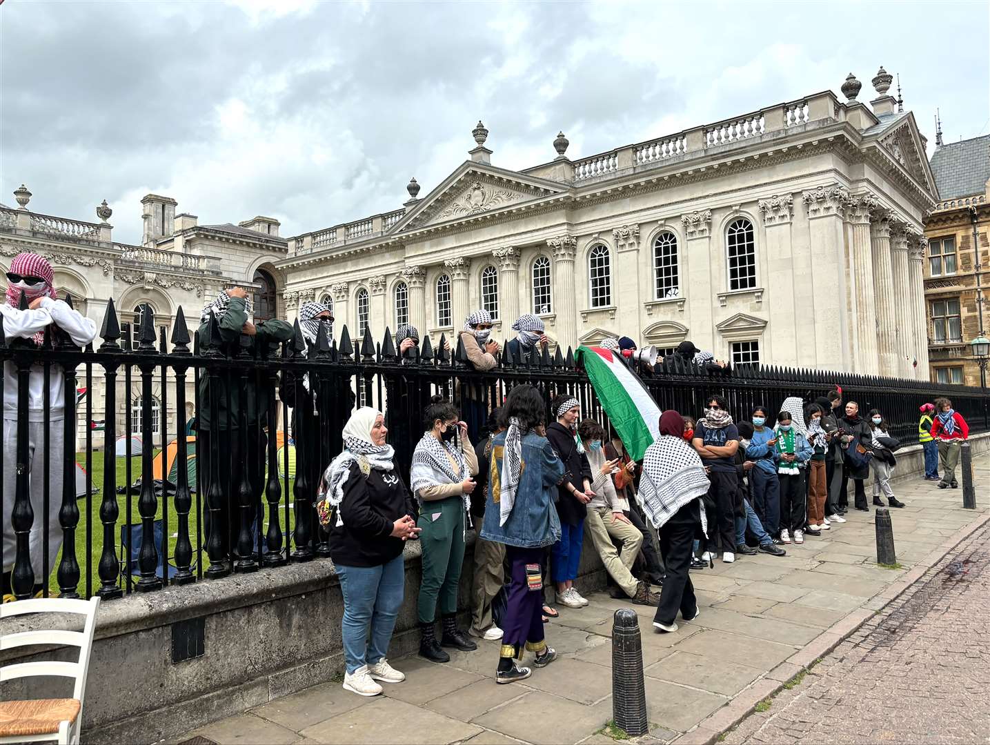 People take part in a protest over the Gaza conflict outside Senate House at Cambridge University (Sam Russell/PA)