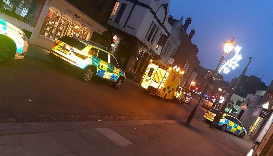 Police cars and an ambulance were called to Rochester High Street at the time. Picture: Sally at Off The Wall Photography