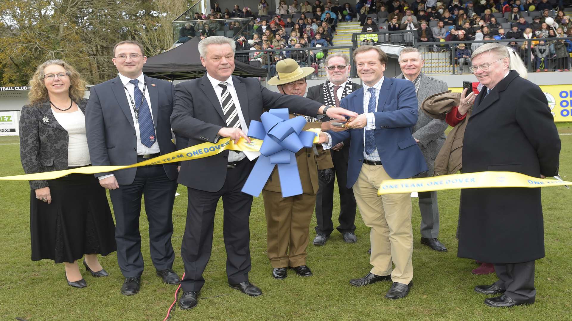 Dover Athletic chairman Jim Parmenter and Dover MP Charlie Elphicke cut the ribbon to mark the opening of the new stand at Crabble Picture: Tony Flashman