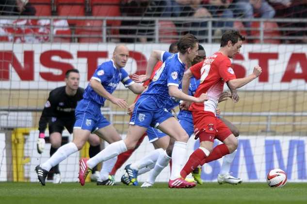 David Mooney takes on the Gillingham defence to score Leyton Orient's fourth goal. Picture: Barry Goodwin