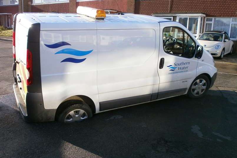 This Southern Water van had to be pulled free by another vehicle after a hole appeared in the road