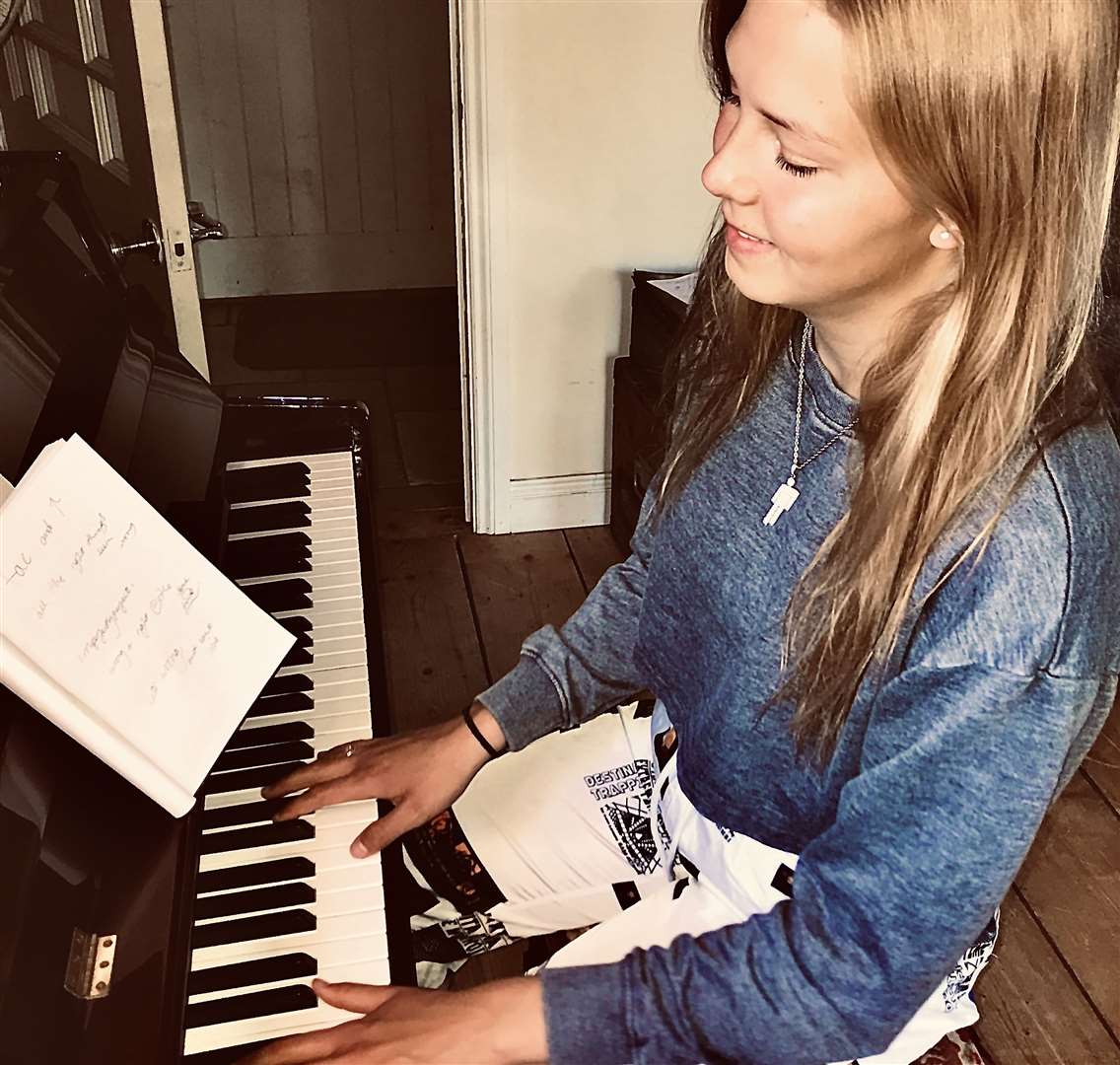 Immy Stroud spends lots of her time sat at the piano, writing songs