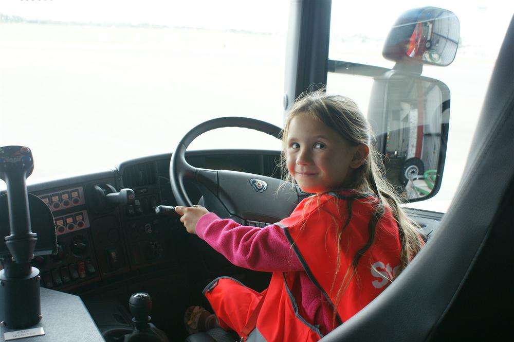Amelia-Rose Lucas behind the wheel of the fire truck named after her