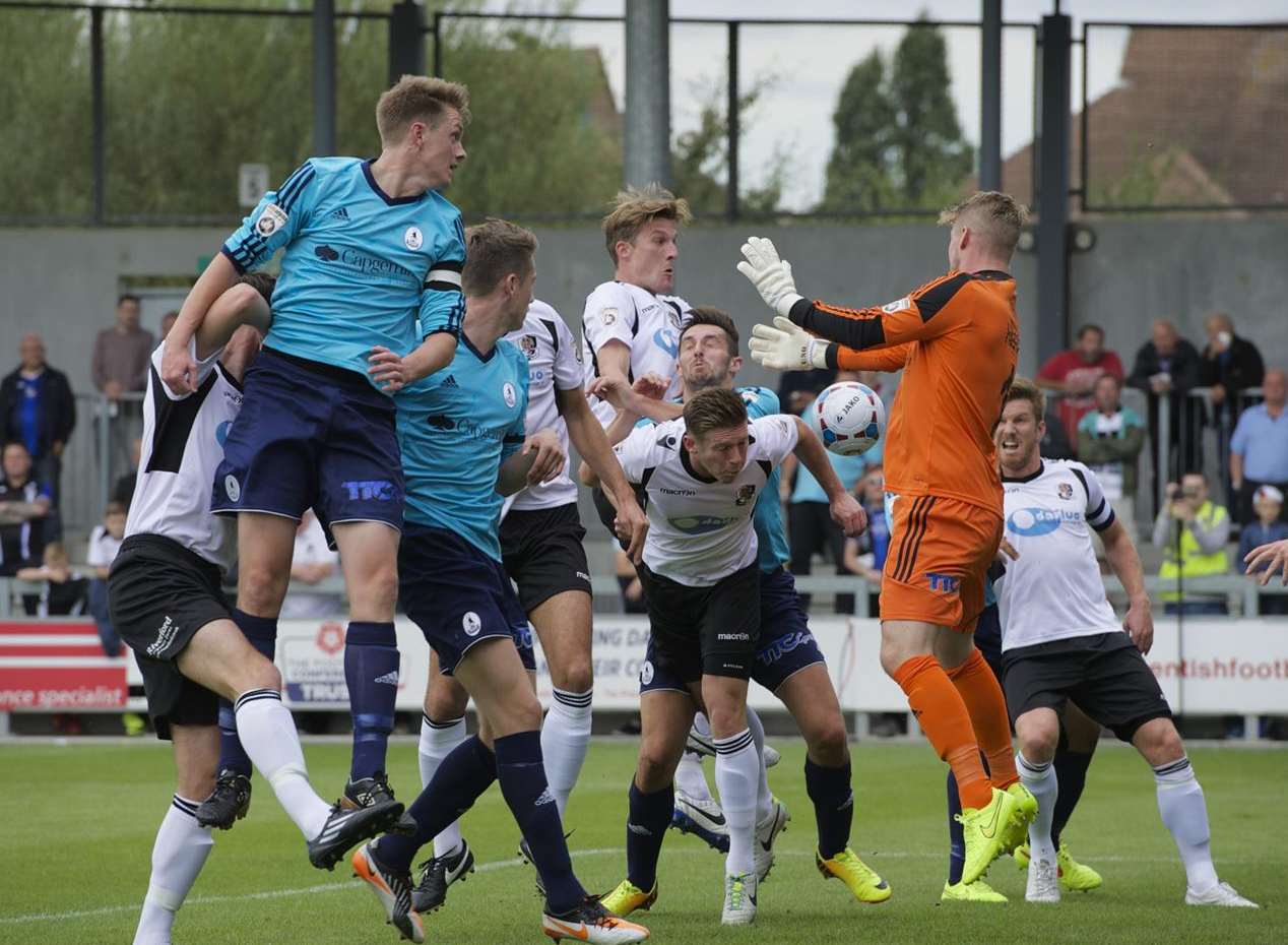 Players from both sides pile in as Dartford try to convert a corner Picture: Andy Payton