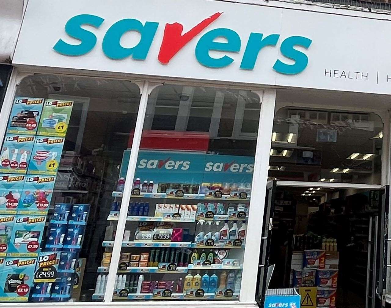Two people have been charged after a shop worker was allegedly punched in the face and scratched at a Savers