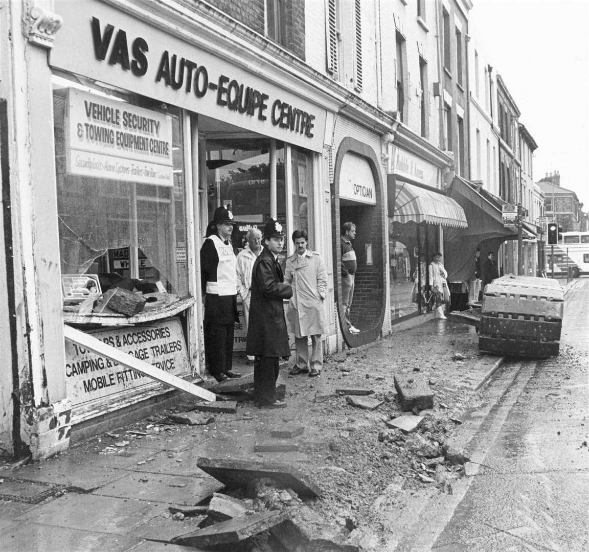 This was the devastation caused when a 17-ton caterpillar track slid off a lorry in Gillingham high Street in August 1987. It shattered paving stones and sent one hurtling through this shop window, narrowly missing an elderly customer