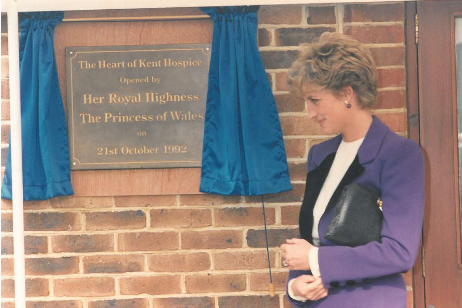 The late Diana, Princess of Wales, unveiling the plaque at the hospice's official opening