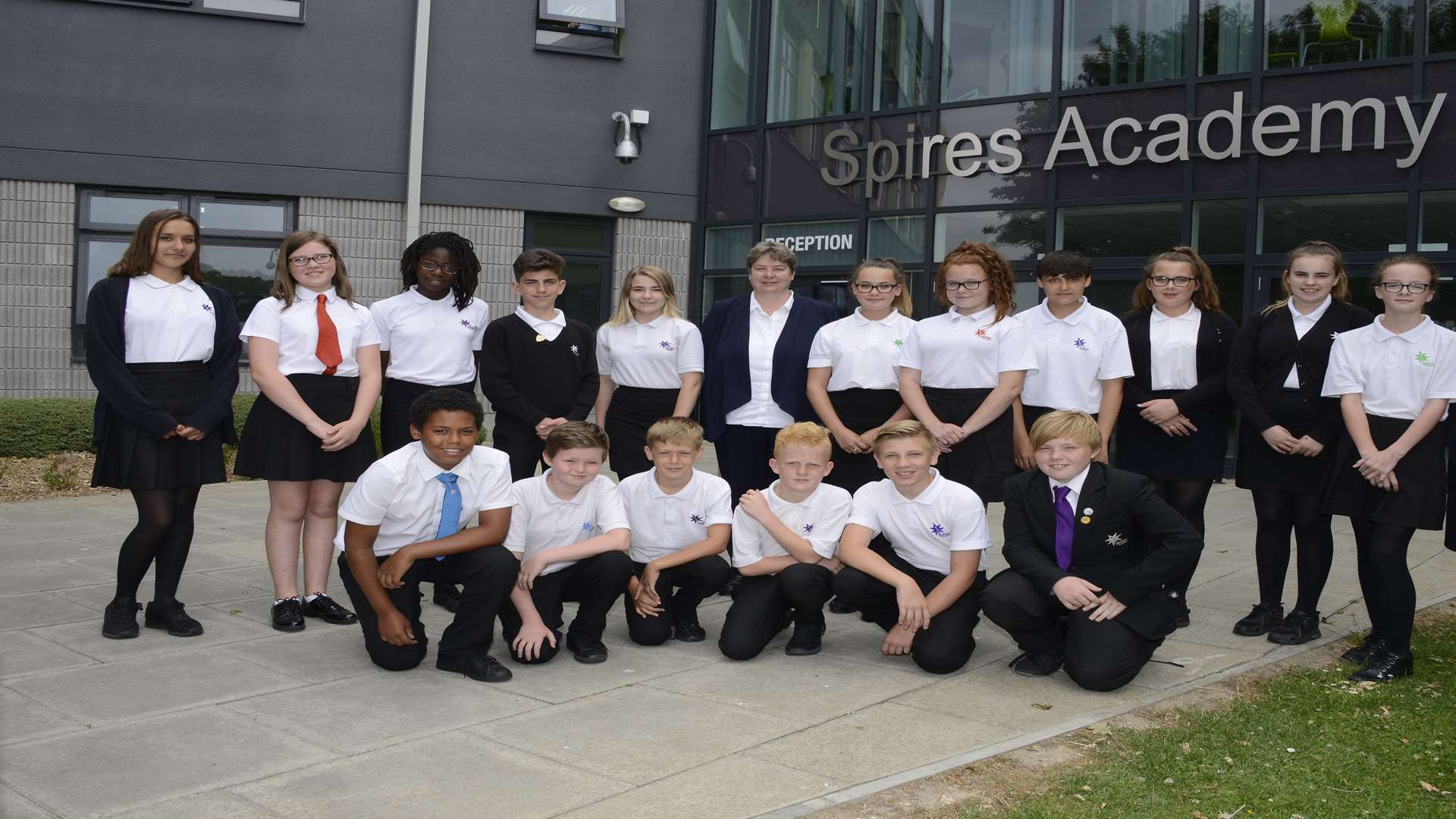 Canterbury Spires Academy celebrate a good Ofsted report.Head Teacher Nicki Mattin with some of her students celebrating the report Picture: Paul Amos FM4826183