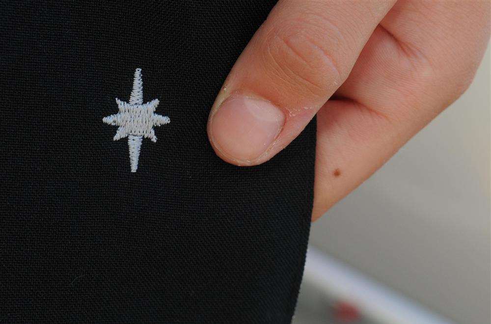 Pupils were sent home from the North School for not wearing a new badge on their uniform