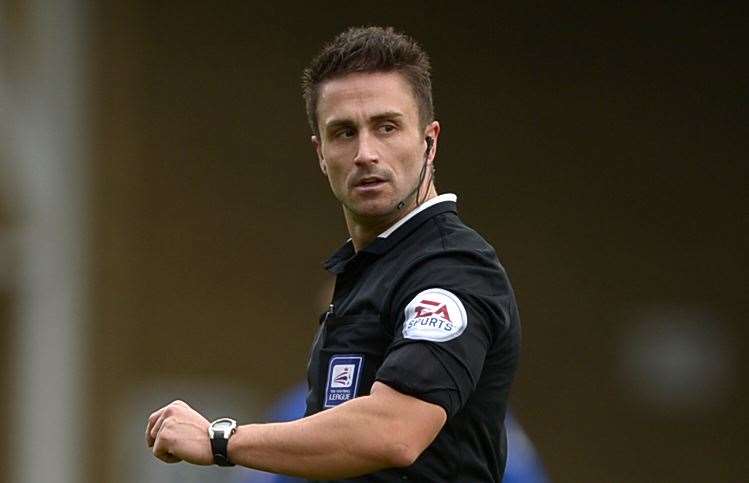 Referee James Adcock was in charge of the game between Shrewsbury and Gillingham