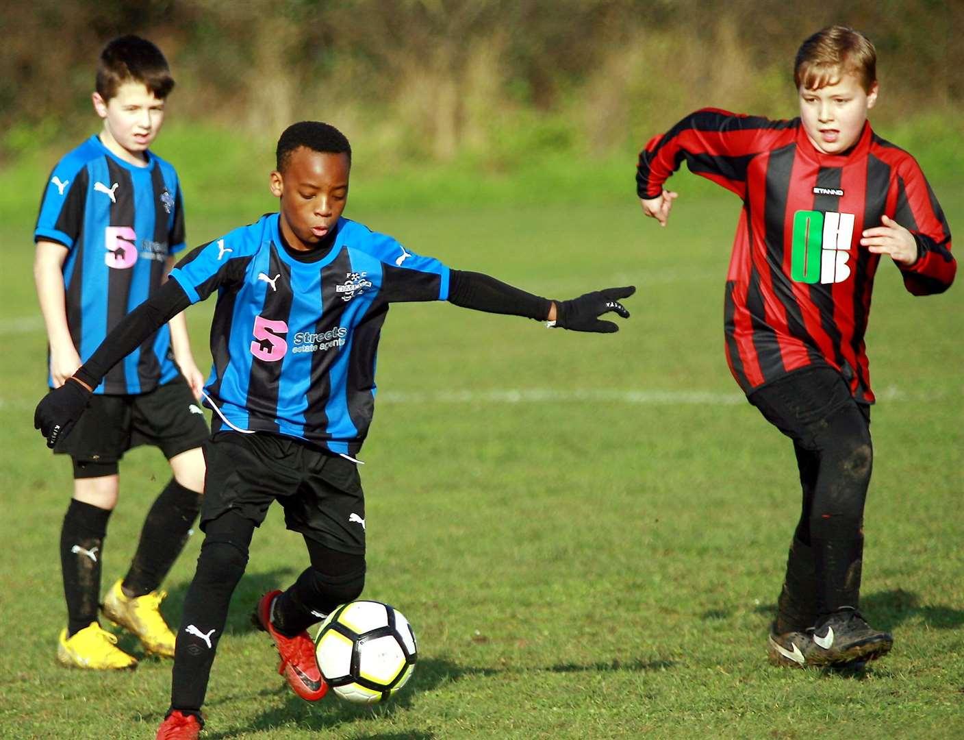 Omega 92 under-11s on the ball against Woodcoombe Youth Picture: Phil Lee FM6625655