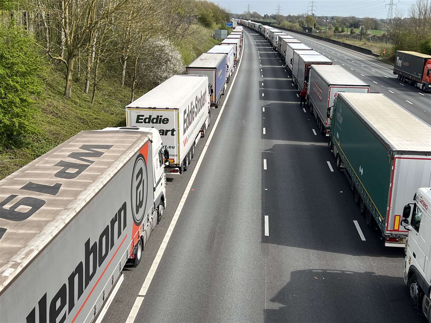 Lorries queue on the M20 motorway in Kent, near Sellindge, as part of Operation Brock. Picture: Barry Goodwin