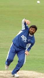 Mushtaq Ahmed, usually so dangerous with the ball, helped Sussex add 156 runs for the last two wickets