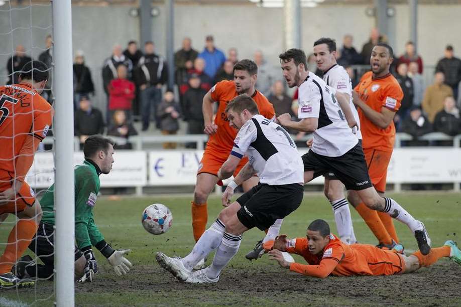 Elliot Bradbrook tries to bundle the ball in Picture: Andy Payton