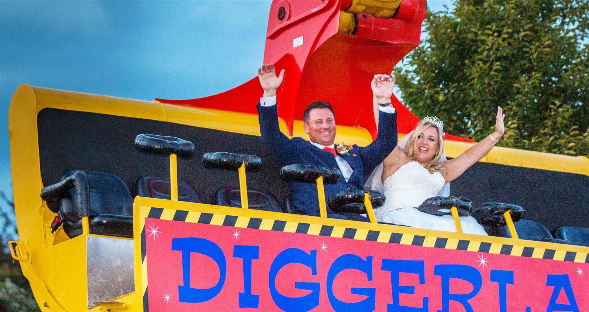 Hayley and Ian Westlake were the first couple to get married at Diggerland: Credit: Sally Masson Photography