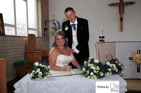 Brian Reddington and Angela Harrison on their wedding day. PHOTO: Life Wedding Photography