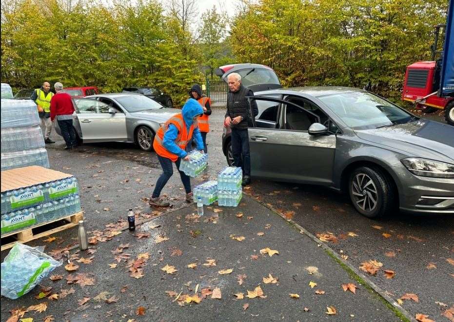 People using a water station during the shortages two weeks ago. Picture: UKNIP
