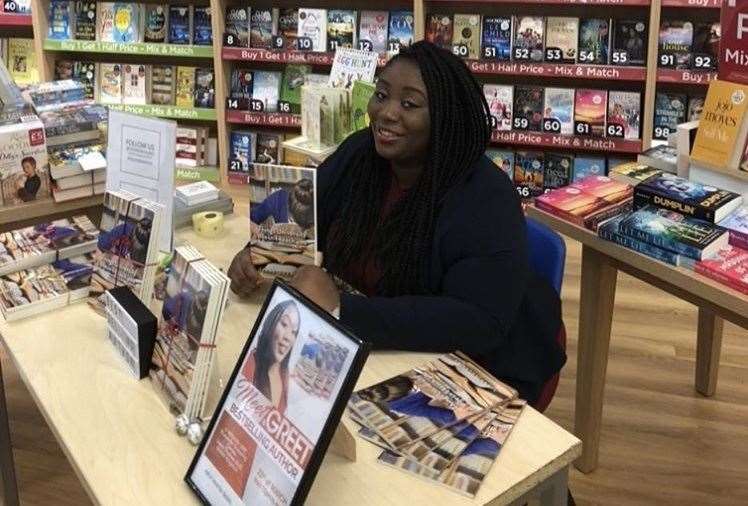 Sarah Adenaike at a book signing for Things University Doesn’t Teach You