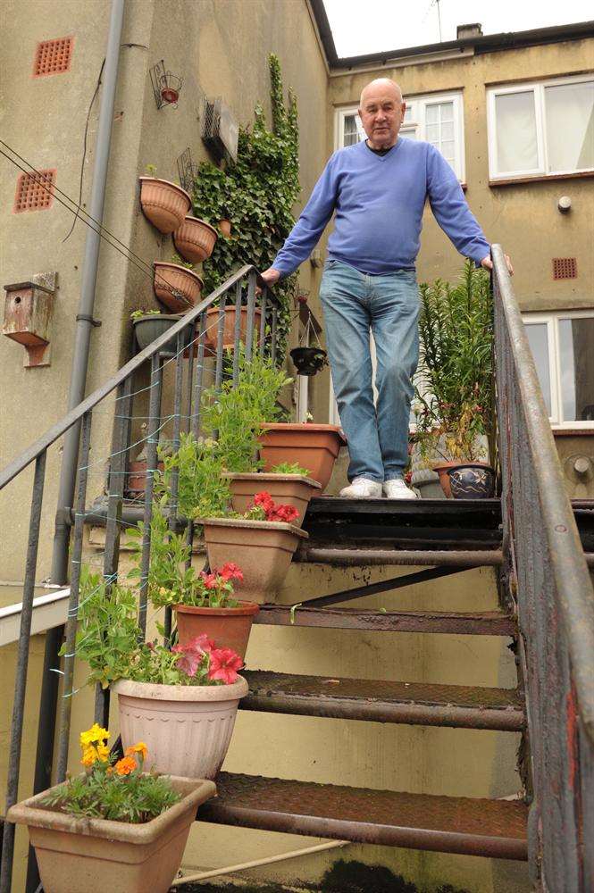 Alan Hindlet on the stairs where he fell at home