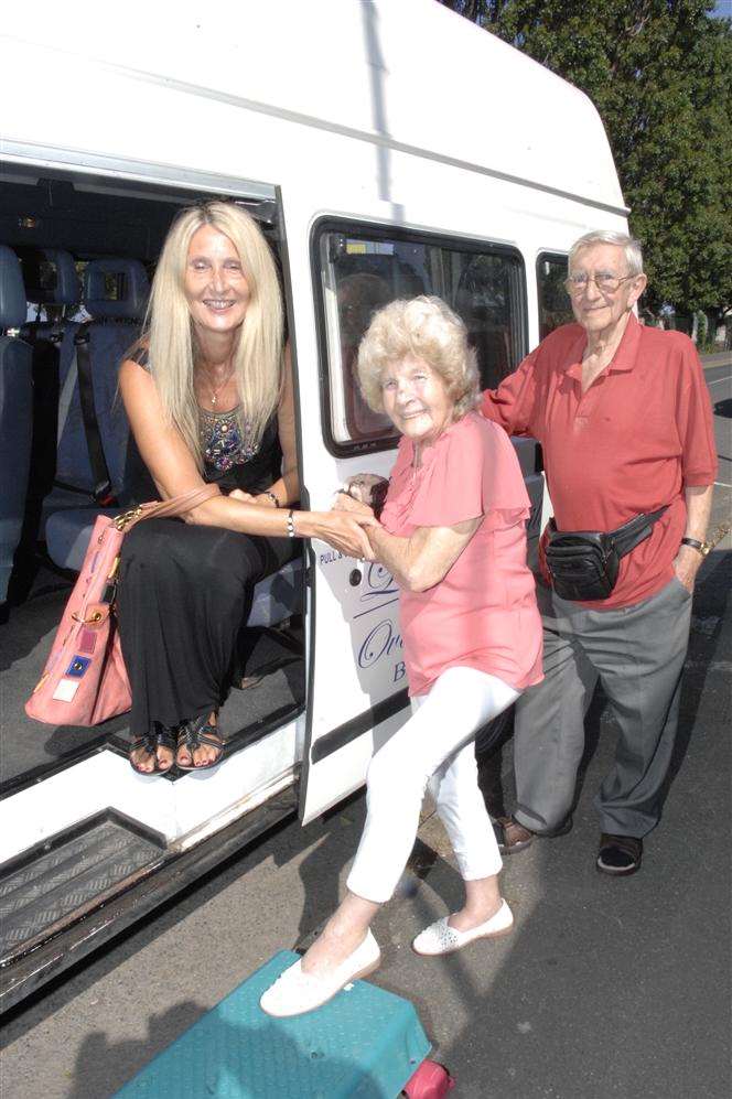 Yvonne Arnold, Jean Mars and John Smith board the Leysdown Over 60s Club minibus